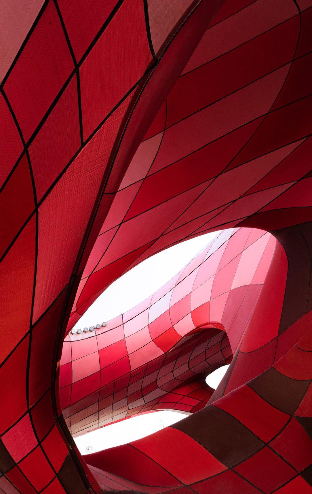 3D printed modified-plastic panels in six shades of red