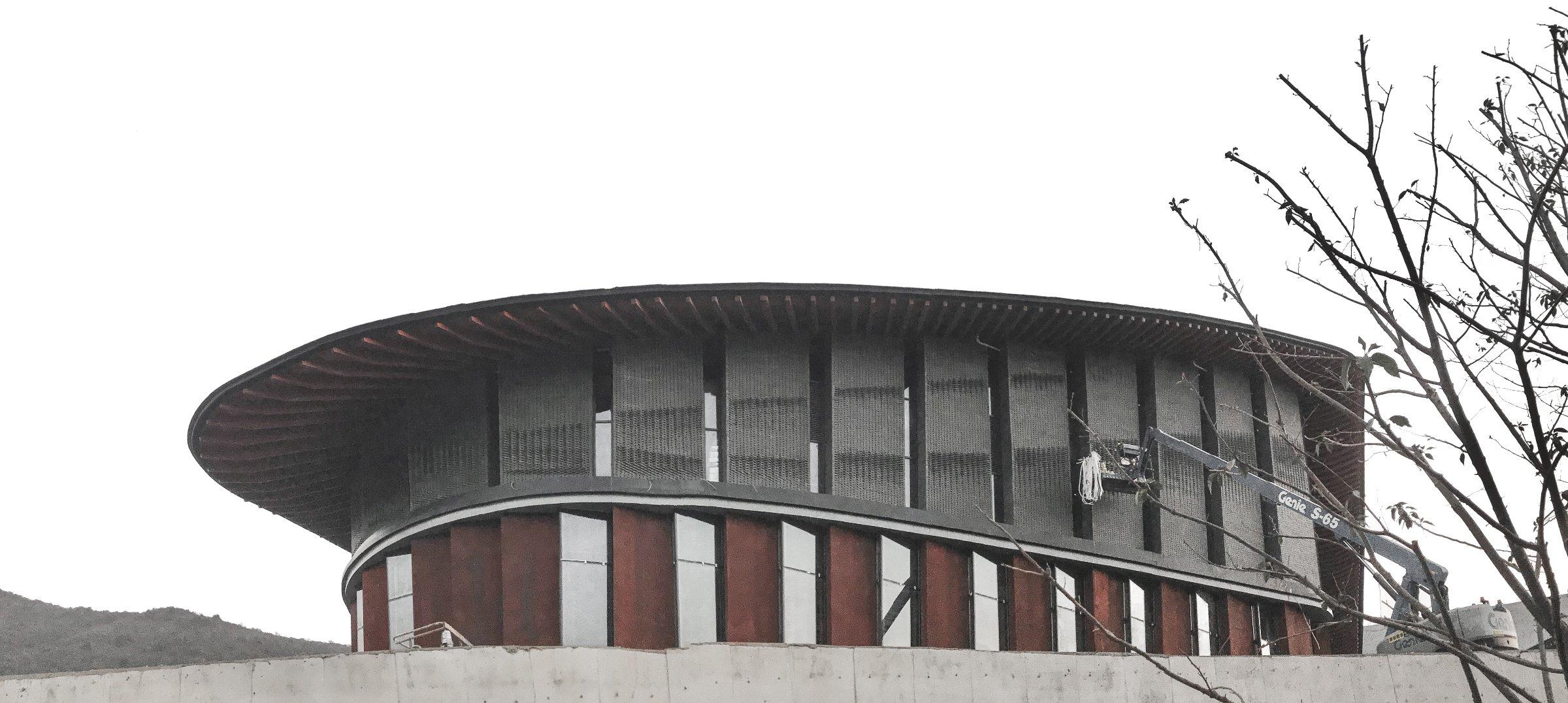 Robotic brick facade of the banquet hall — the 'thousand miles of rivers and mountains' wall