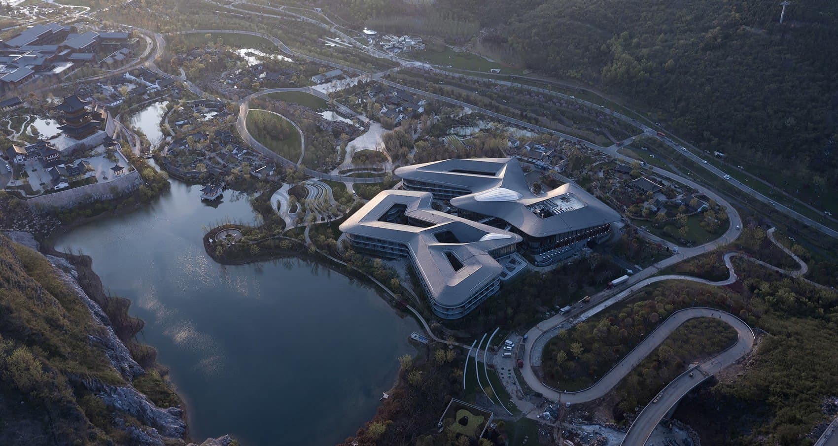 Aerial view of the Radisson Collection Resort winding through the Nanjing Garden Expo quarry landscape
