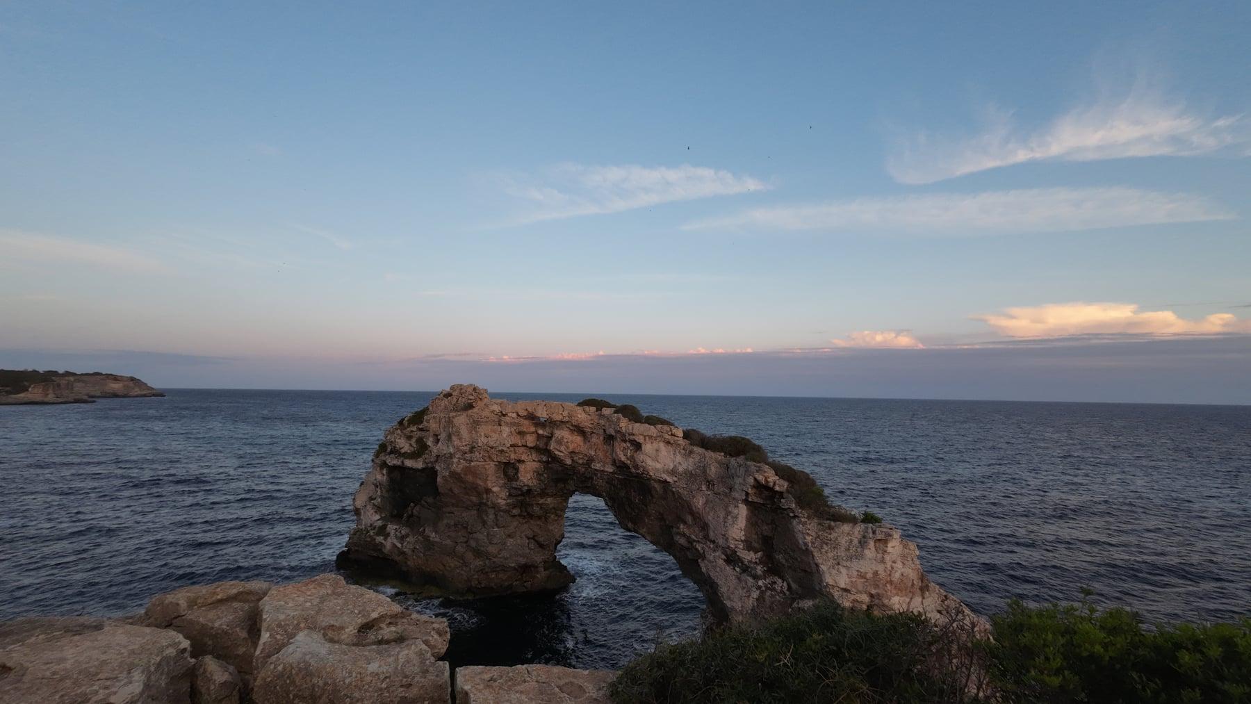 Sea arch and cliff