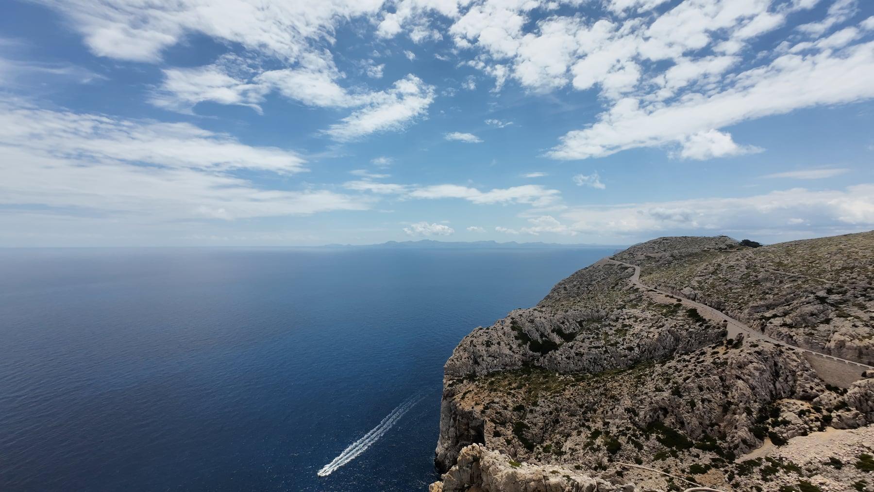Cliff and boat from above