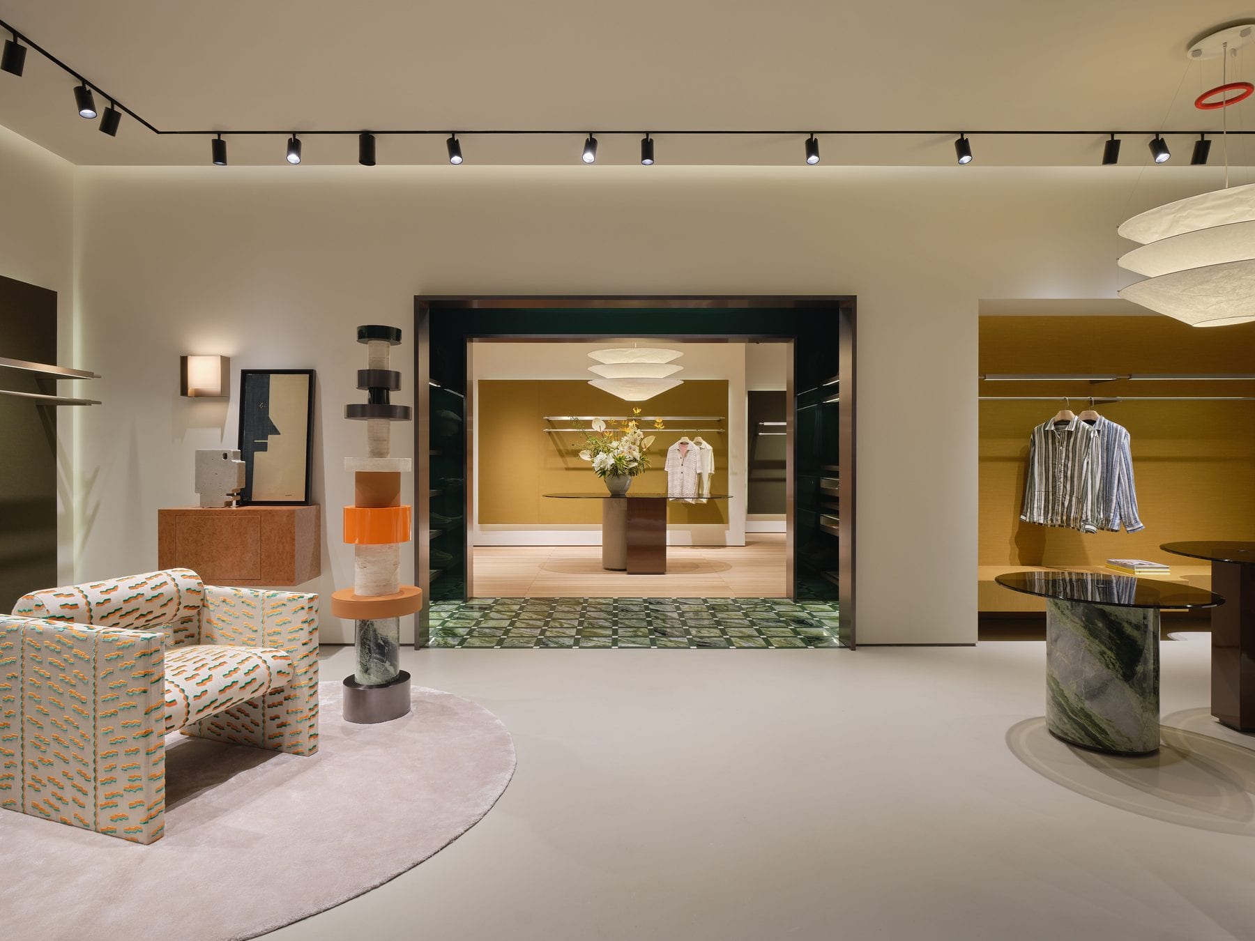 Interior panorama — lounge chairs and stone display tables