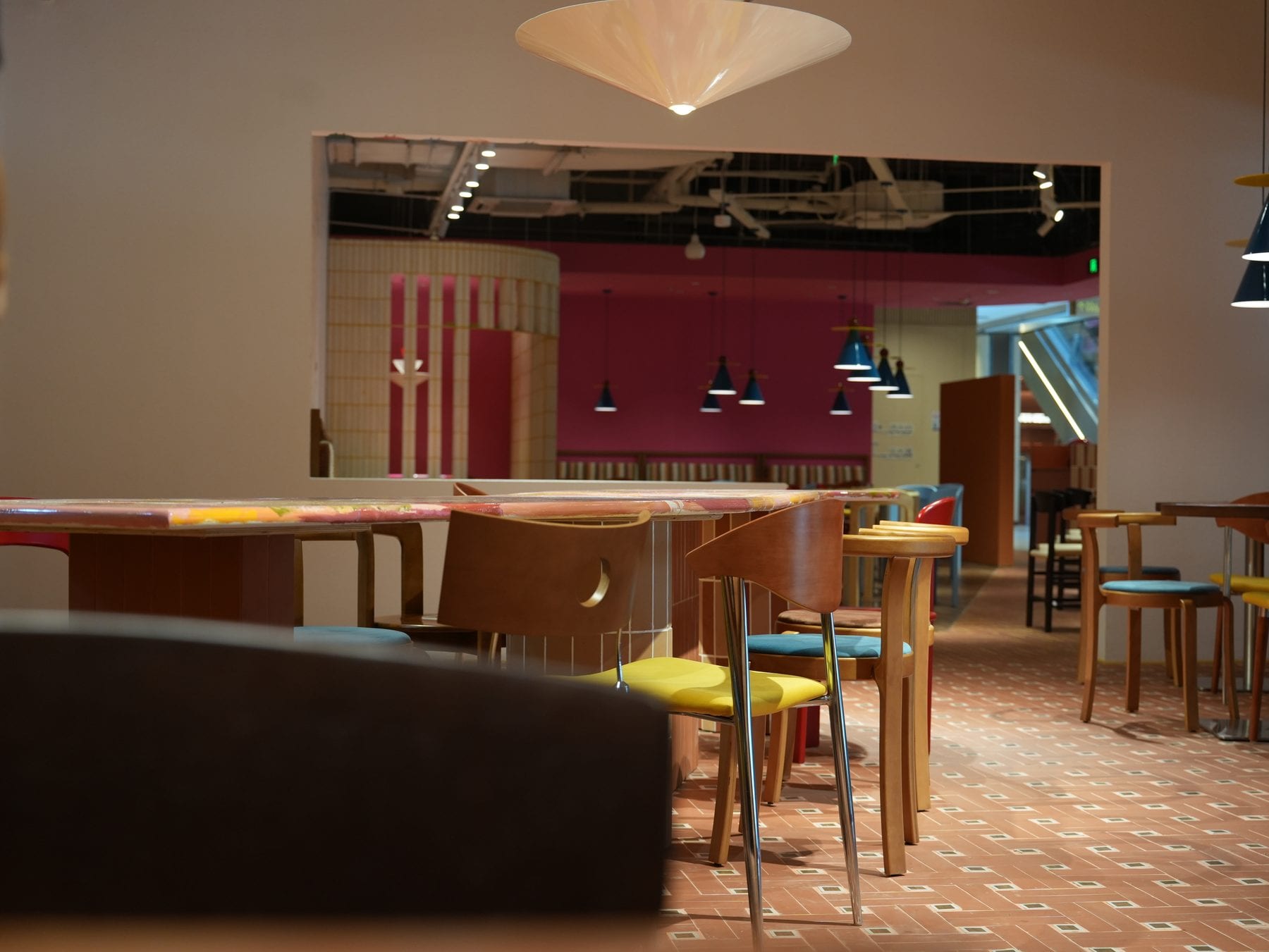 The main dining hall with terracotta tile floor