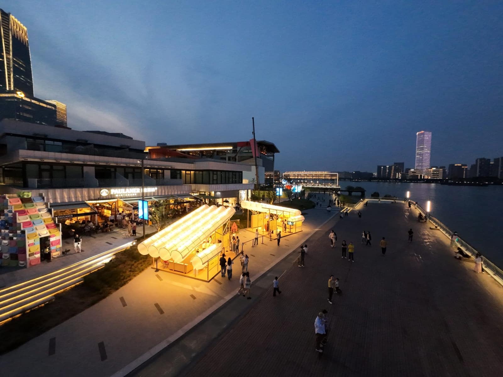 Night drone view of the pavilions on the retail street