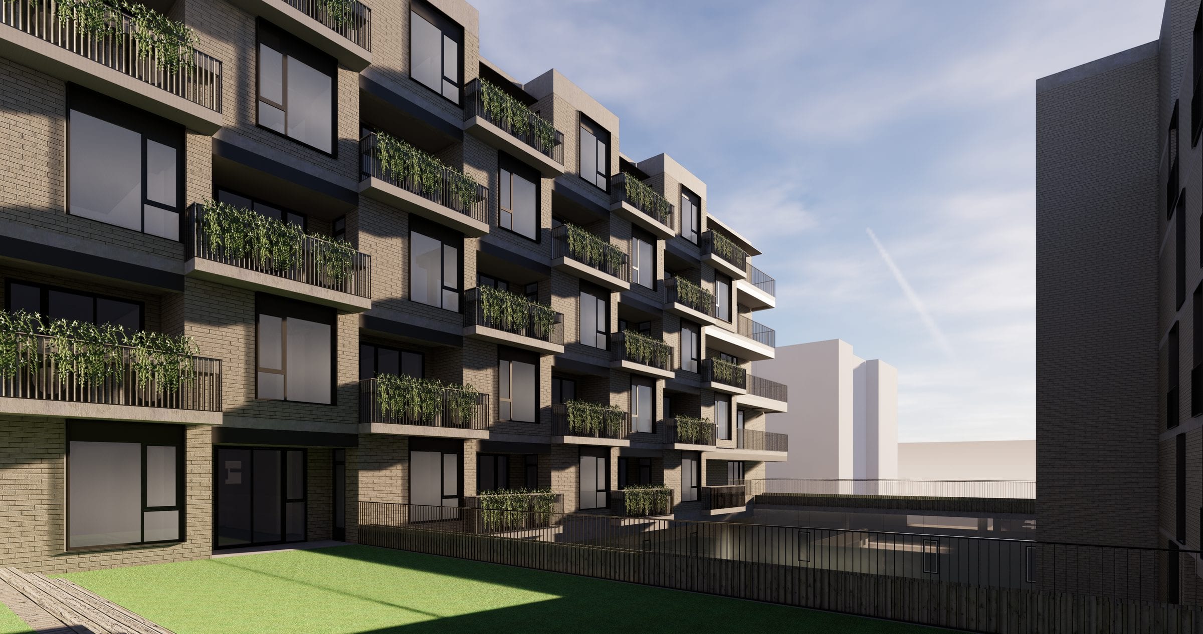 Inner courtyard of the elderly care home with staggered balconies and planted parapets