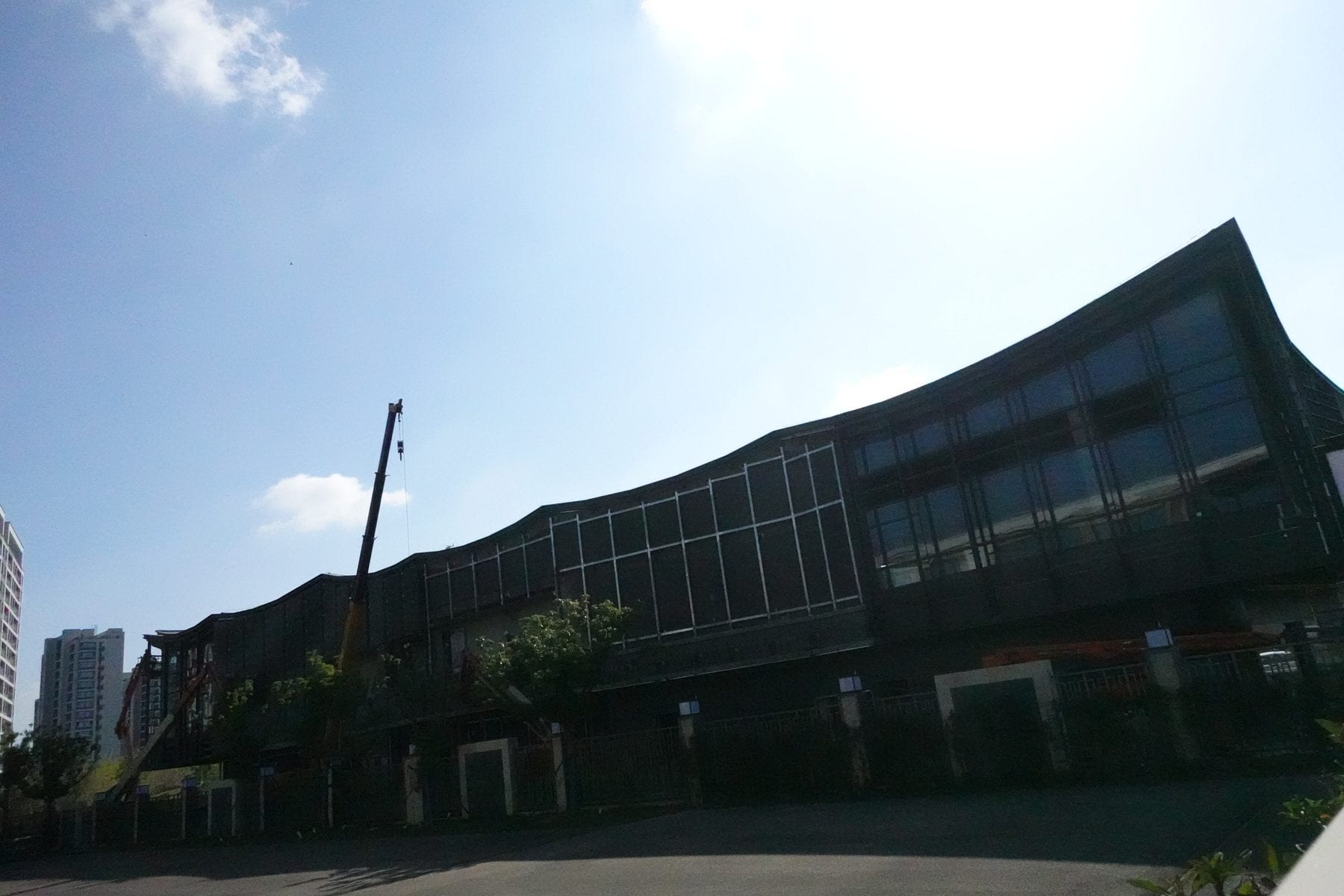 Undulating roofline of the granary renovation against the sky