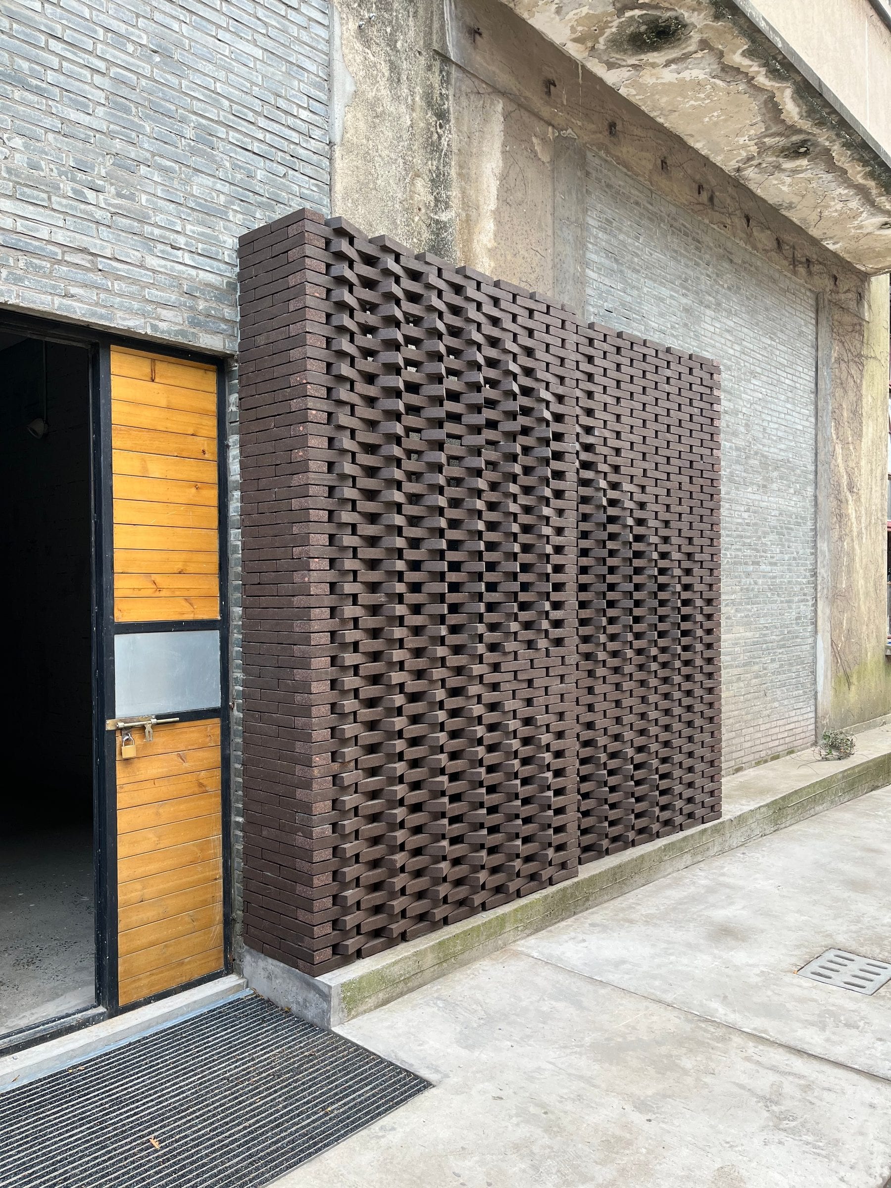 Perforated brick screen at the dock hotel entrance, Panlong Tiandi