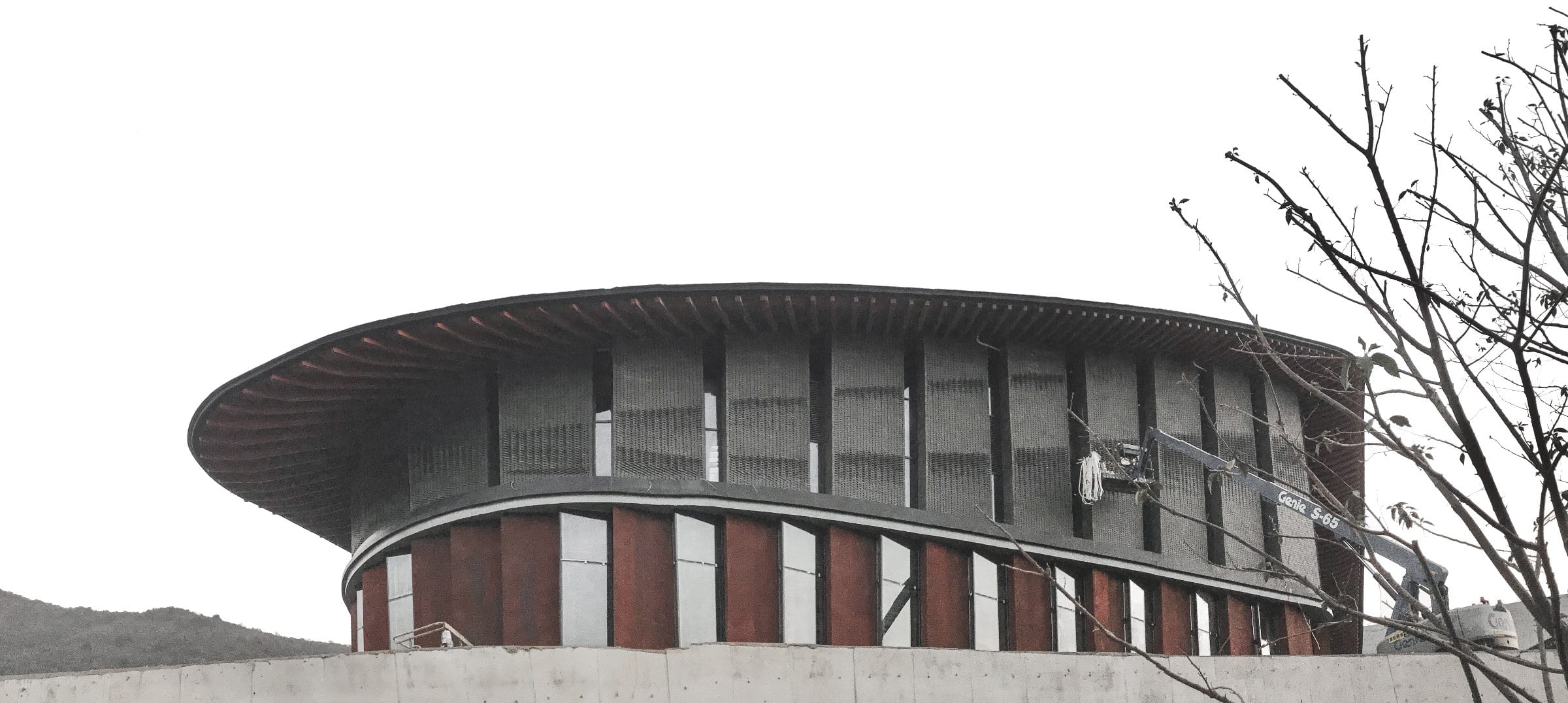 Robotic brick facade of the banquet hall — the 'thousand miles of rivers and mountains' wall