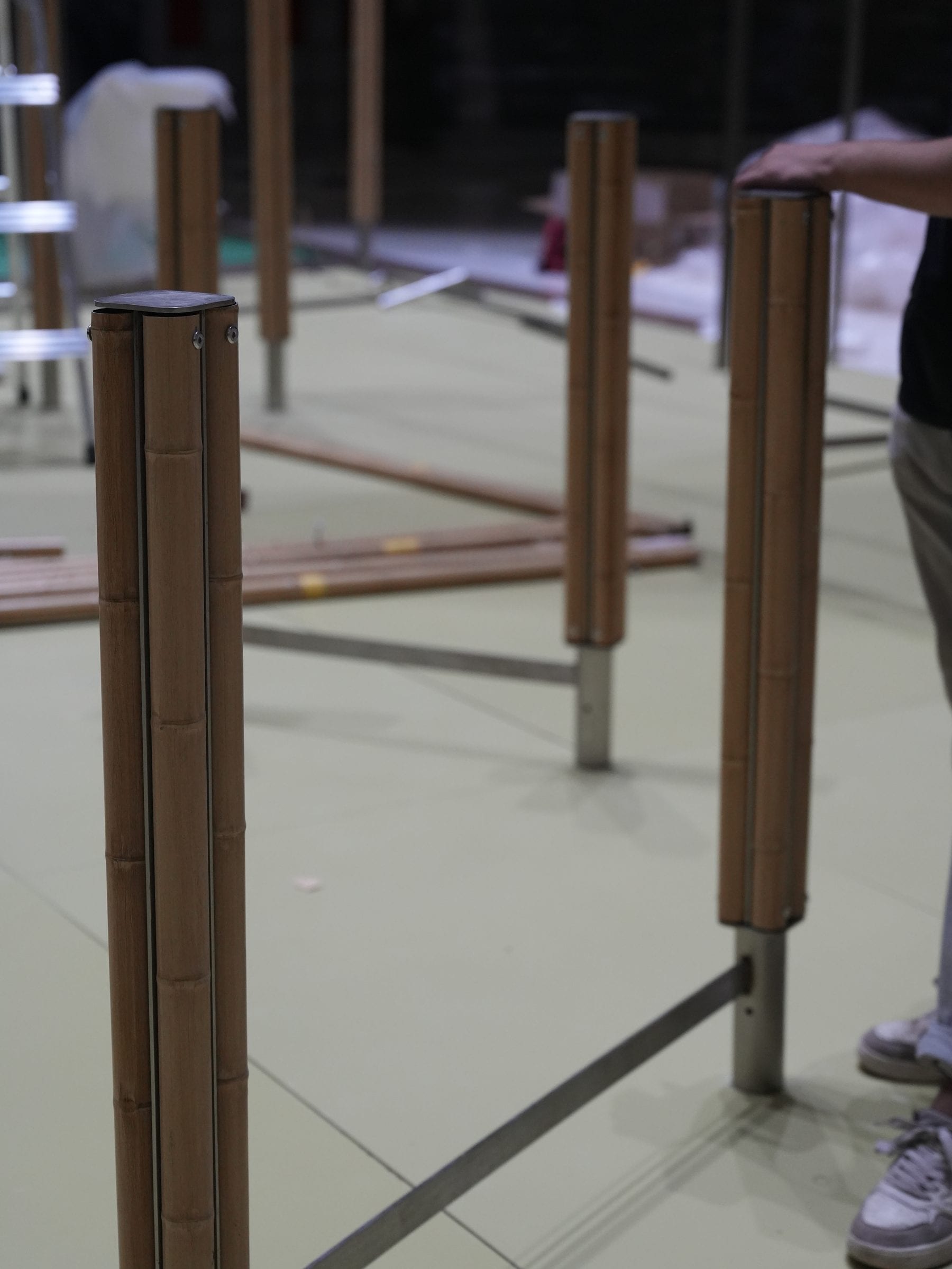 Bamboo-steel columns during installation