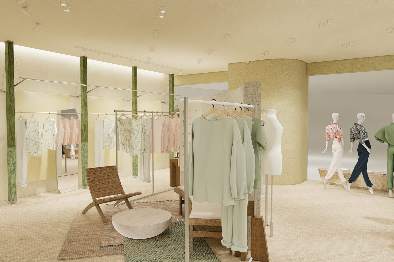 The retail hall with cream walls, granite display wall and green columns