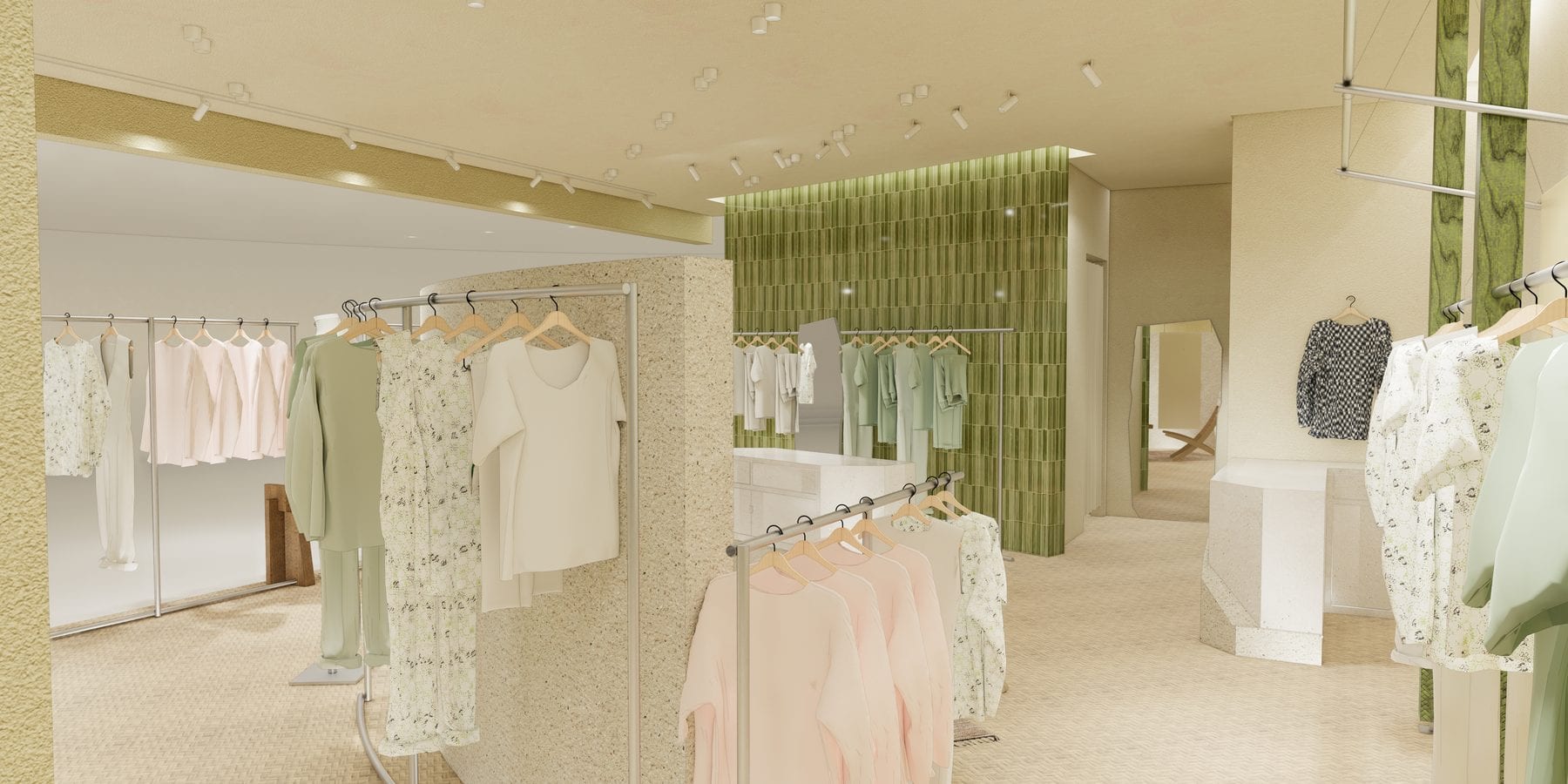 Womenswear display close-up with green tile backdrop