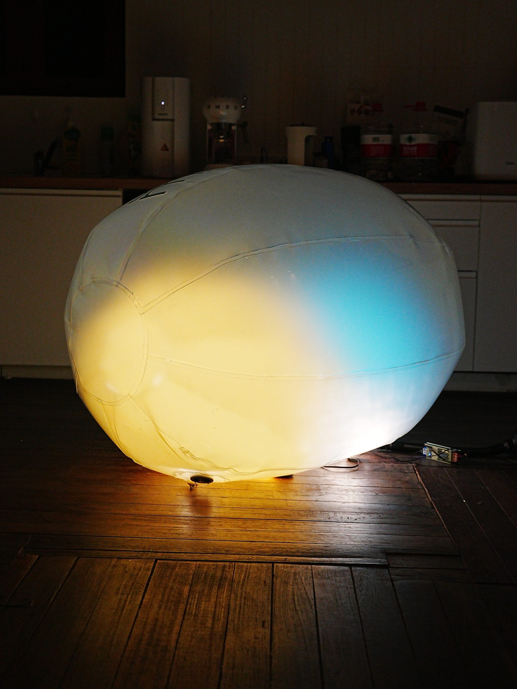 Gradient-glow orb test on the studio floor