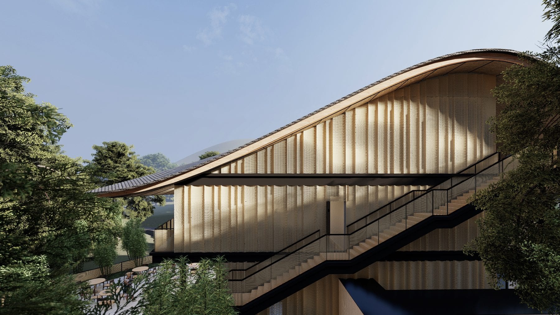 External stair rising alongside the woven facade
