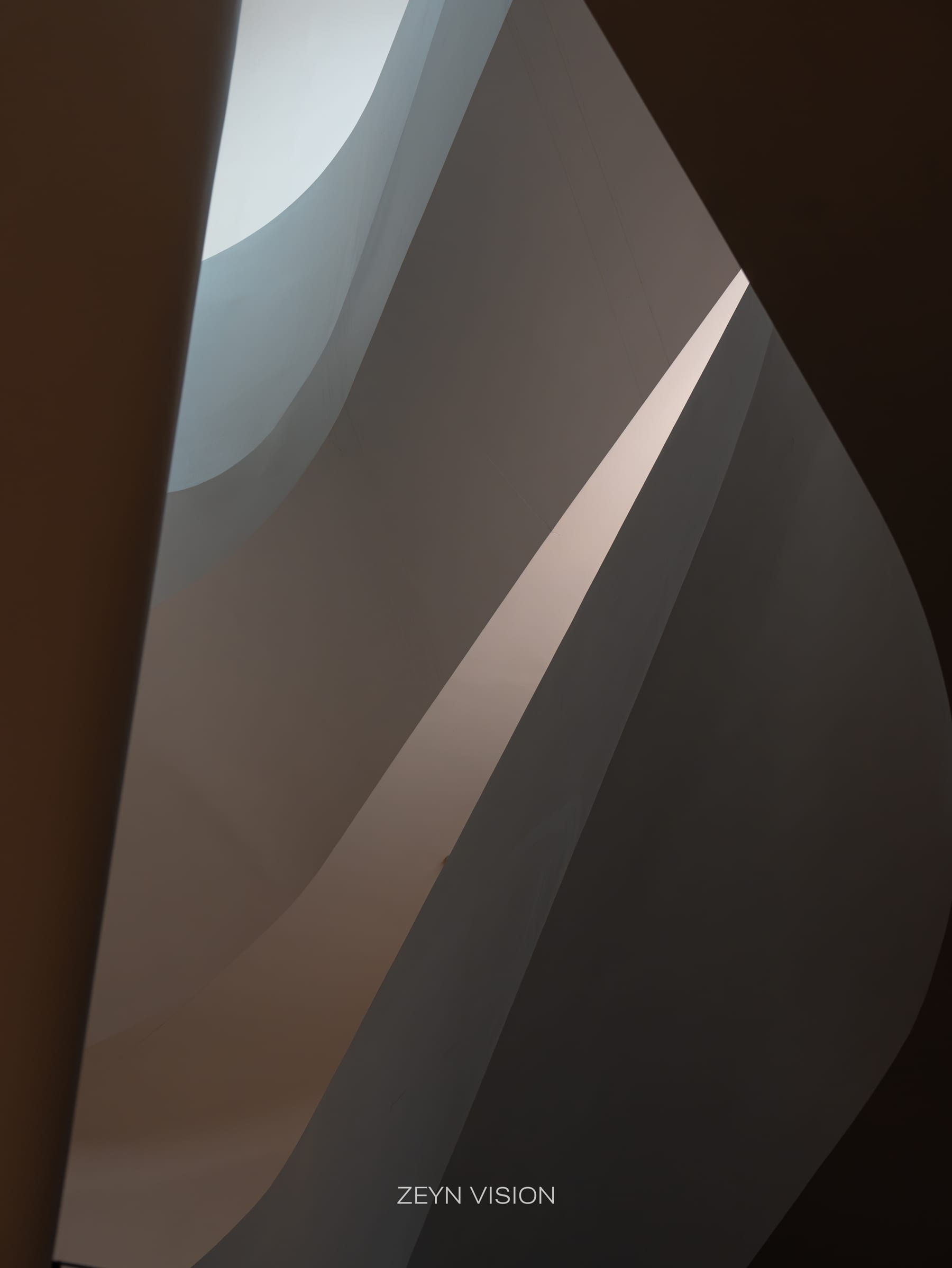 Flowing white surfaces of the atrium, close-up