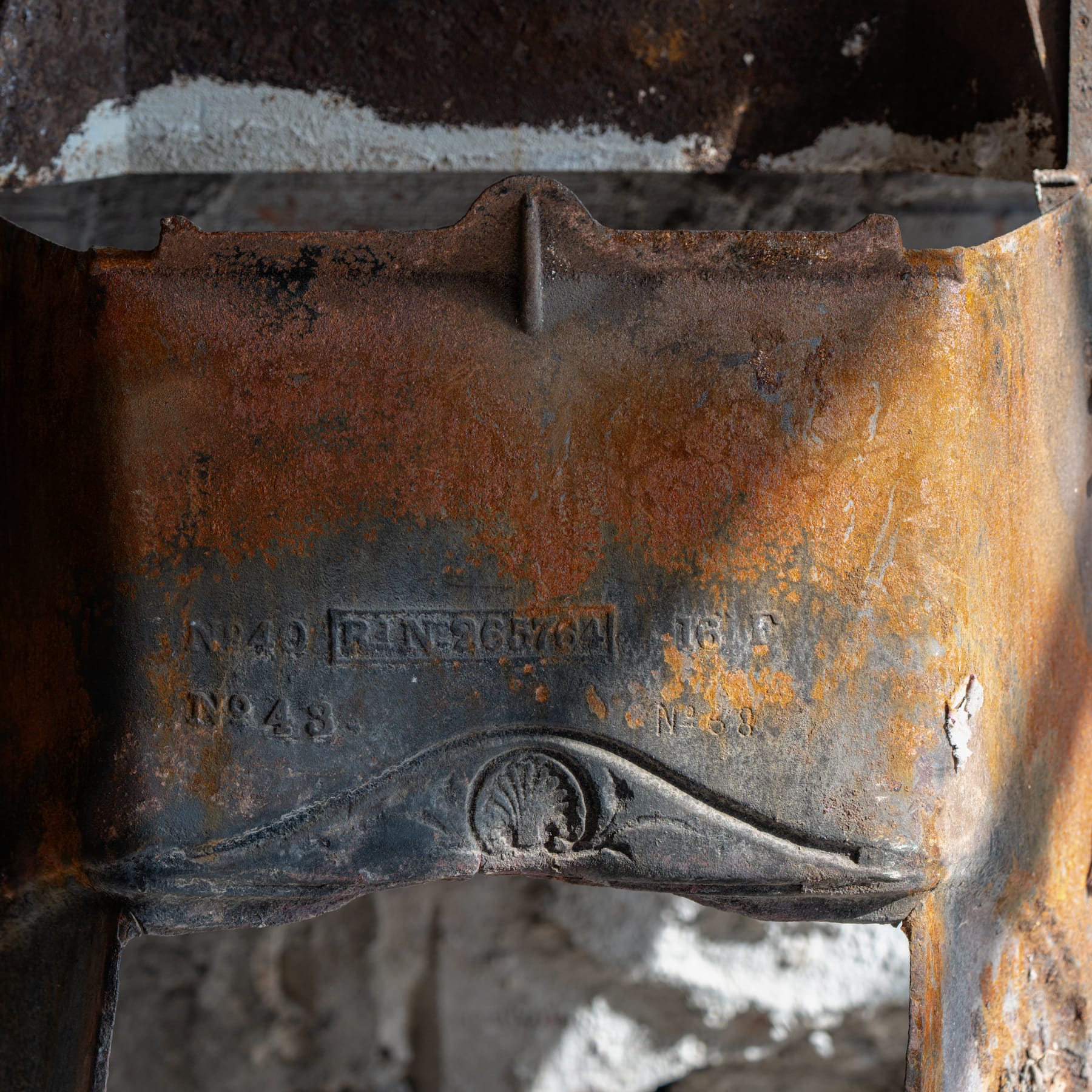Rusted embossed metal plate marked N°49