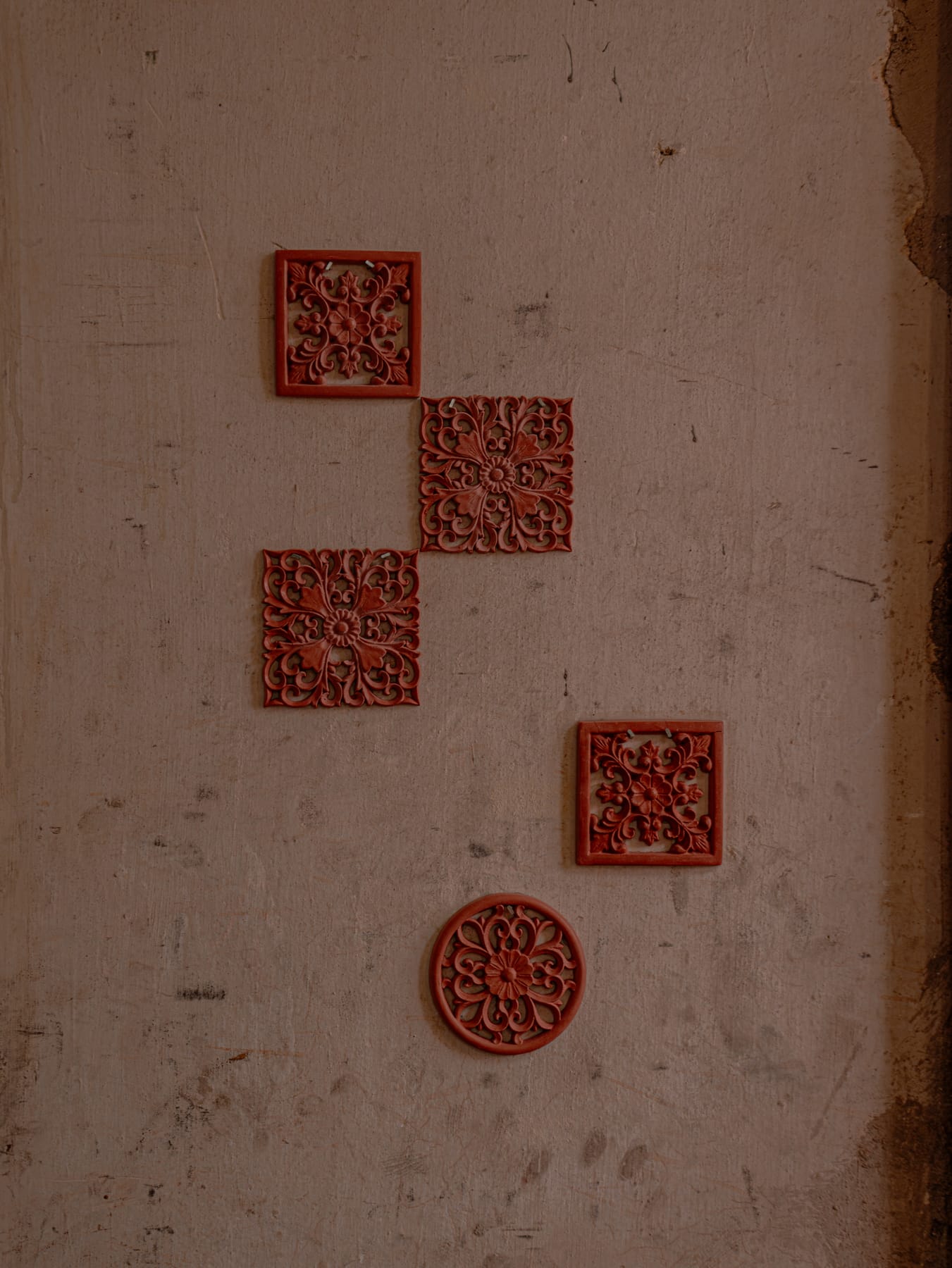 Red paper-cuts on the white wall