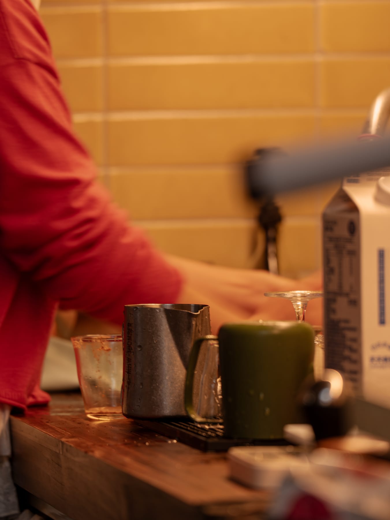Barista at work behind the counter